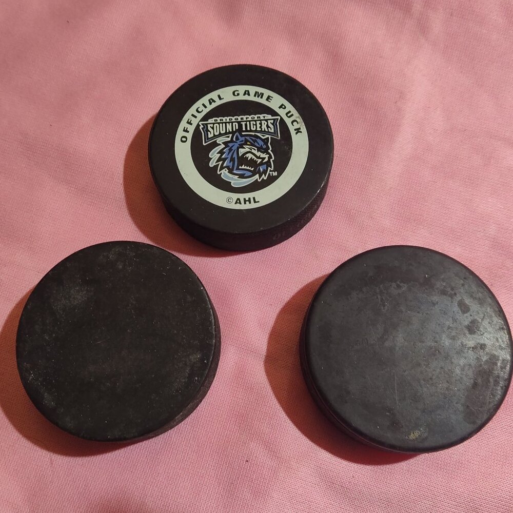 BRIDGEPORT SOUND TIGERS RARE AHL OFFICIAL GAME PUCK + 2 OFFICIAL PUCKS (3 TOTAL)